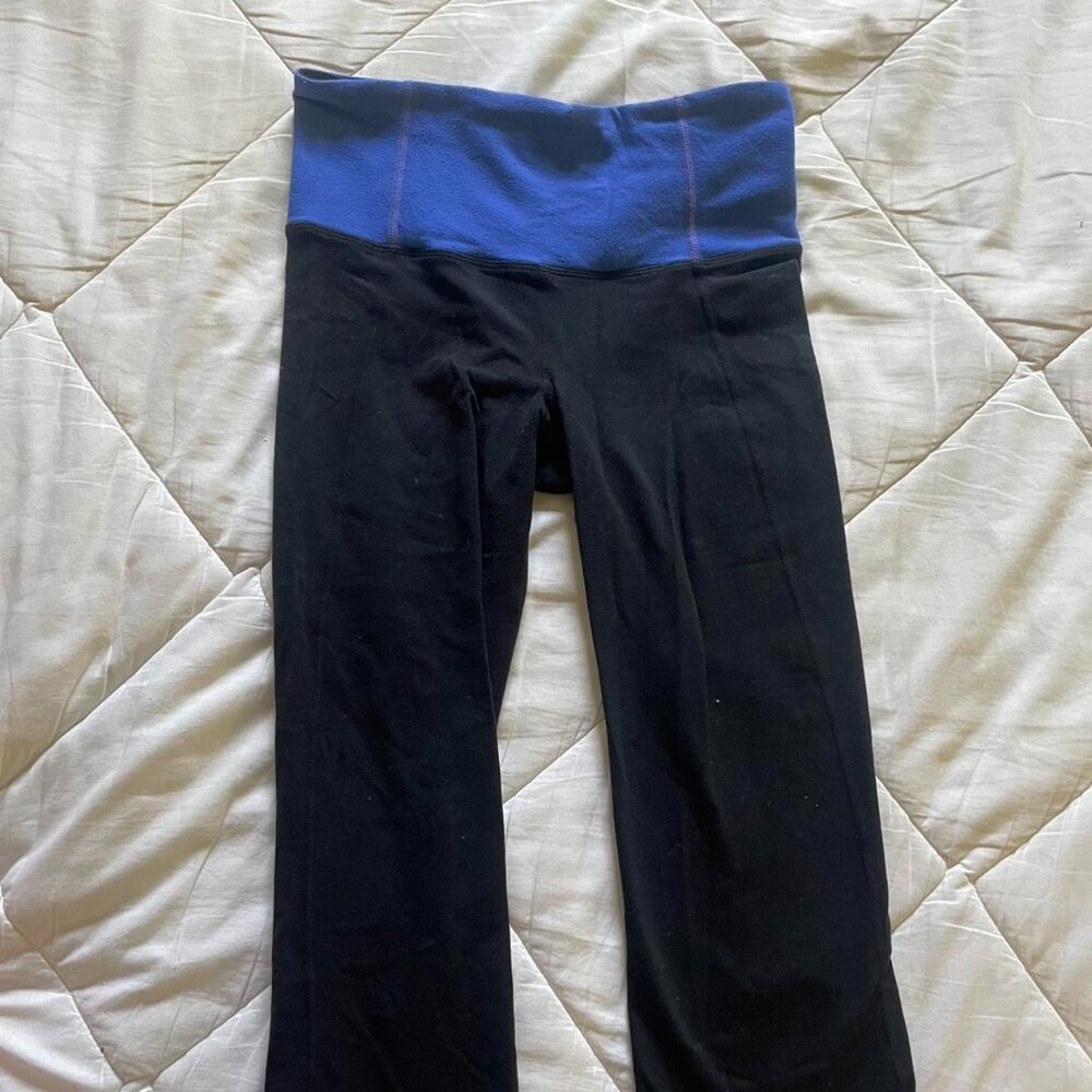 Women’s Black and blue Lululemon capri leggings with ankle slits